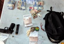 En cateo FGR asegura arma, dinero y a una persona en Tecomán, Colima