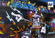 Artistas urbanos pintan con tema mundialista en Tlaquepaque Jalisco