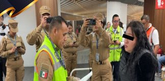 Marina detiene a pasajera con arma de fuego y cartuchos en el AICM